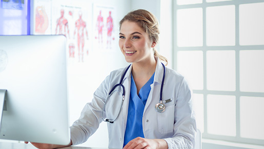 collaborative health nurse working on computer in lynchburg virginia after getting new job