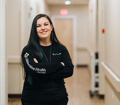 collaborative health nurse working on computer in lynchburg virginia after getting new job