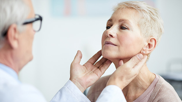 woman getting checked by doctor for thyroid issues at collaborative health endocrinology lynchburg virginia