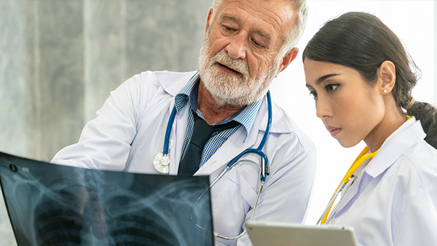 osteopathic medicine specialists at collaborative health in lynchburg virginia looking at patient xray 