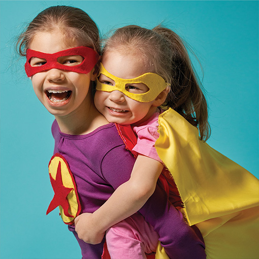 kids in superhero costumes ready to see collaborative health pediatrics for a monthly checkup