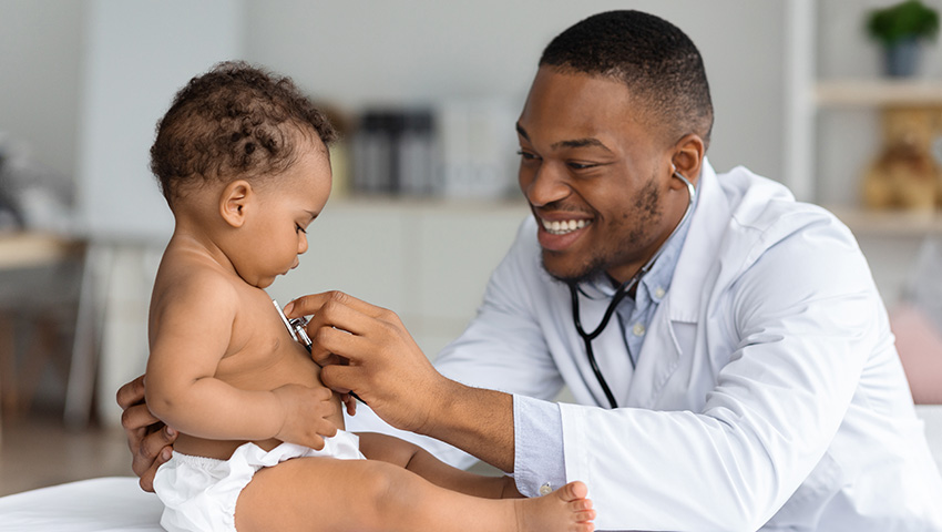 collaborative health pediatrics doctor checking heartbeat of baby in doctors office lynchburg, virginia